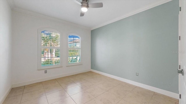 spare room featuring crown molding and ceiling fan