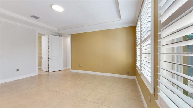 empty room with plenty of natural light and ornamental molding