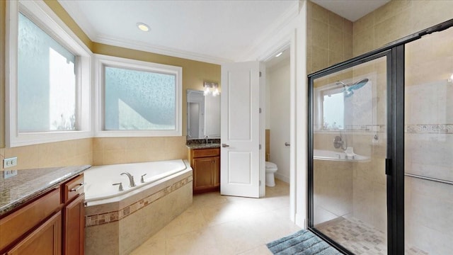 full bathroom with tile patterned floors, vanity, crown molding, independent shower and bath, and toilet