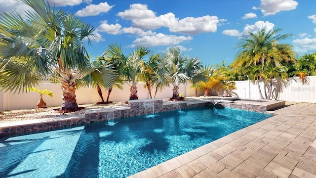 view of pool featuring a jacuzzi and pool water feature