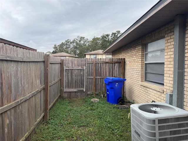 view of yard with central AC unit