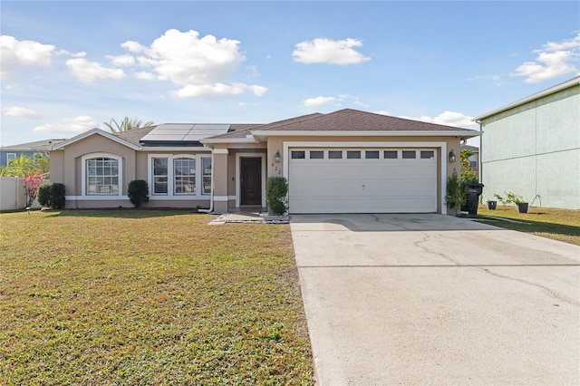 view of front facade featuring solar panels, a garage, and a front yard