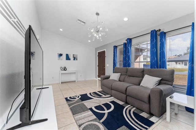 living room with light tile patterned floors, vaulted ceiling, and a notable chandelier