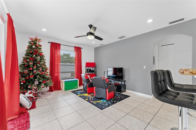 office featuring ceiling fan and light tile patterned floors