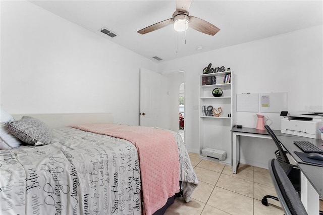 tiled bedroom with ceiling fan