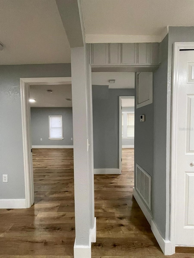 hallway featuring dark hardwood / wood-style floors