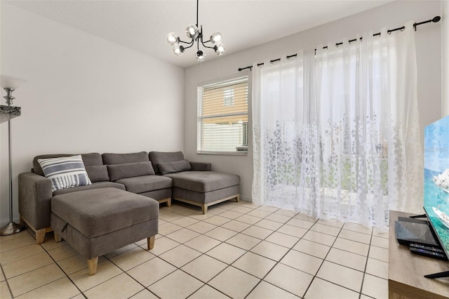 living room featuring light tile patterned floors and a chandelier