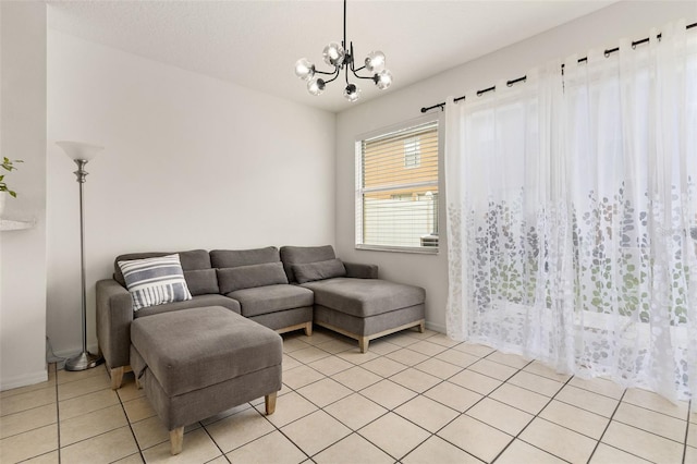 tiled living room featuring a notable chandelier