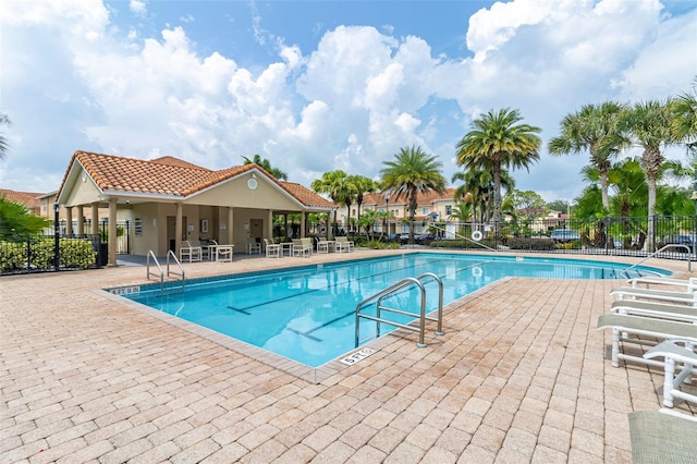 view of pool featuring a patio