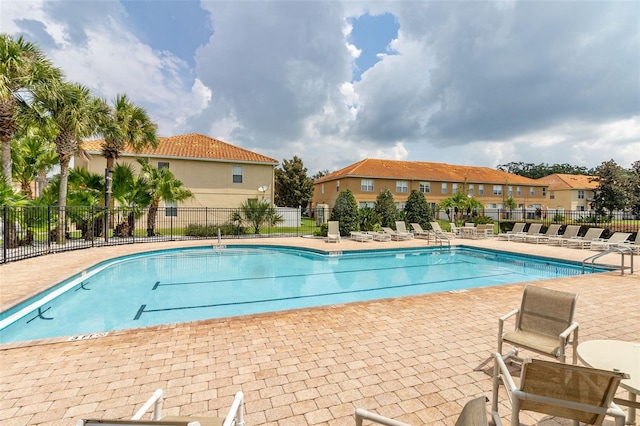 view of pool featuring a patio area