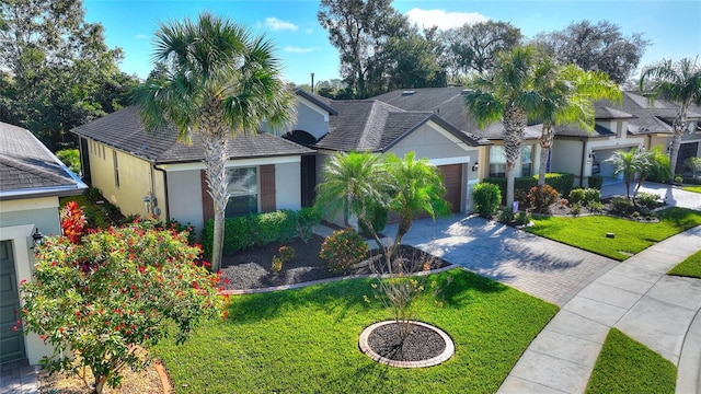 view of front of home with a front lawn