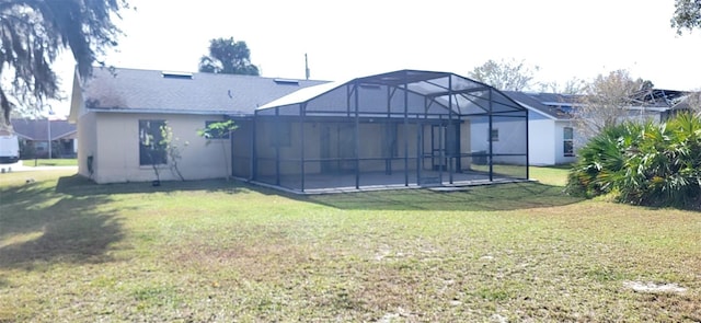 view of yard with a patio and glass enclosure