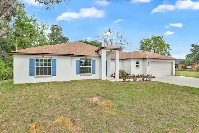 314A Dagama Ct, Kissimmee, FL 34758 - view of front of house featuring stucco siding, a front yard, an attached garage, a shingled roof, and concrete driveway