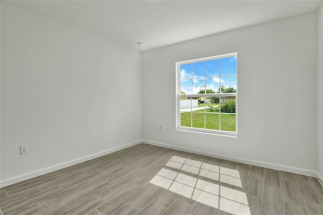 314A Dagama Ct, Kissimmee, FL 34758 - unfurnished room featuring baseboards and wood finish floors