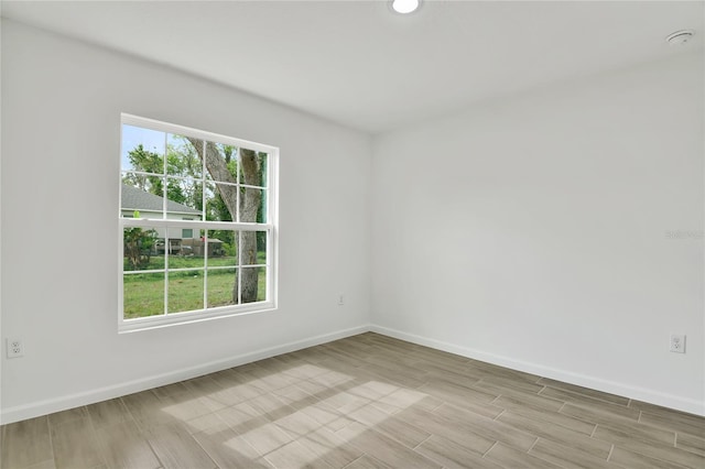 314A Dagama Ct, Kissimmee, FL 34758 - empty room featuring baseboards and wood finish floors