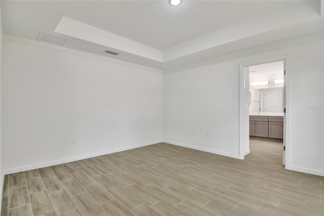 314A Dagama Ct, Kissimmee, FL 34758 - empty room featuring visible vents, baseboards, and wood finish floors