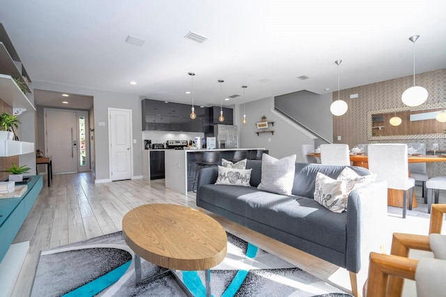 living room featuring light hardwood / wood-style flooring