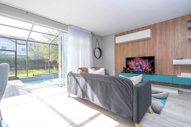 living room featuring wooden walls