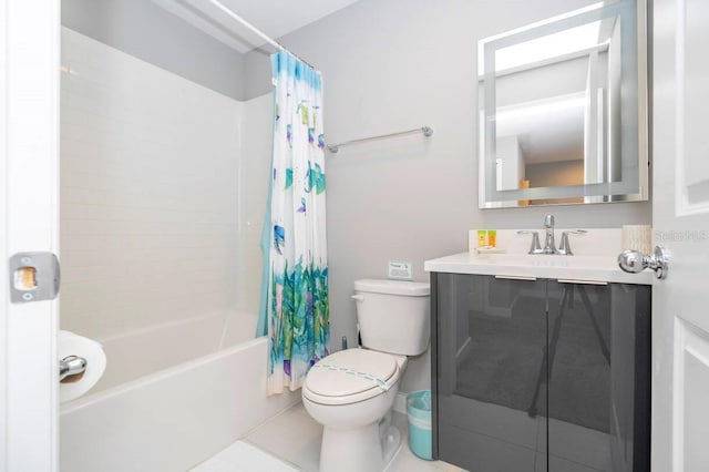 full bathroom featuring tile patterned flooring, vanity, toilet, and shower / tub combo