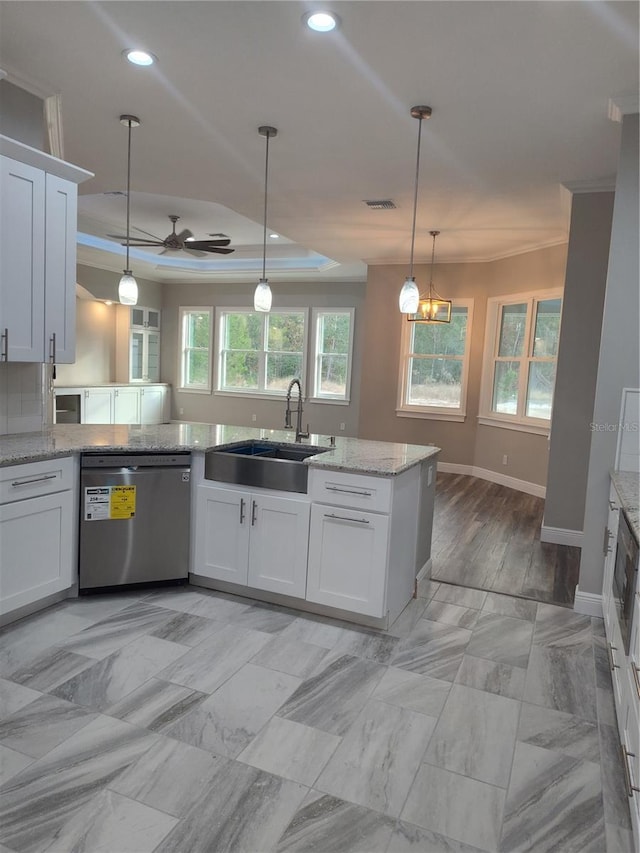 kitchen featuring dishwasher, white cabinetry, a wealth of natural light, and sink