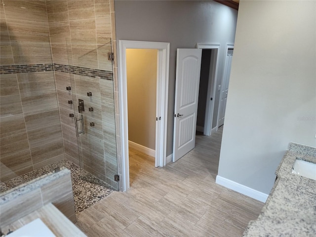 bathroom featuring vanity and walk in shower