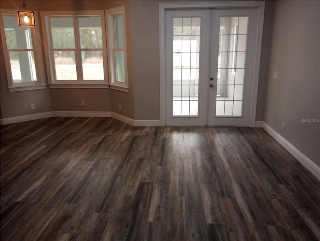 doorway to outside featuring french doors and dark hardwood / wood-style flooring