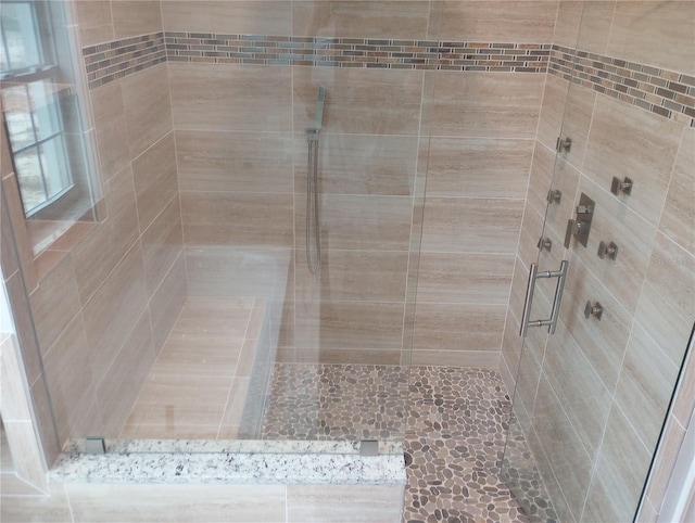 bathroom with walk in shower