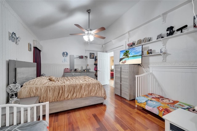 bedroom featuring hardwood / wood-style flooring and ceiling fan