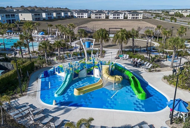 view of pool featuring a water slide