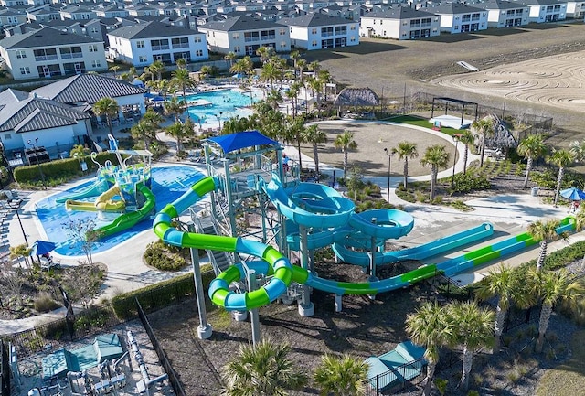 birds eye view of property with a residential view
