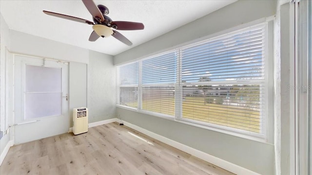 1006 Plantation Dr Unit F12, Kissimmee, FL 34741 - unfurnished room featuring light wood-style floors and ceiling fan