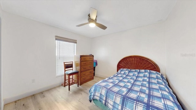 1006 Plantation Dr Unit F12, Kissimmee, FL 34741 - bedroom with wood finished floors and ceiling fan