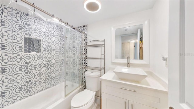 full bathroom featuring vanity, toilet, and shower / washtub combination