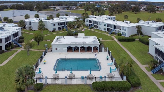 1006 Plantation Dr Unit F12, Kissimmee, FL 34741 - view of subject property with a pool area