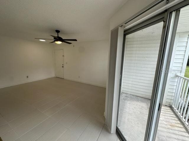 spare room featuring ceiling fan