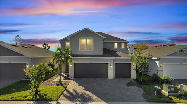 view of front of property featuring a garage