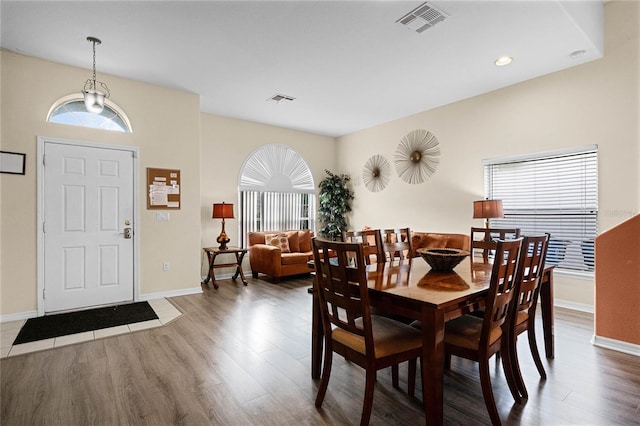 dining area featuring hardwood / wood-style flooring