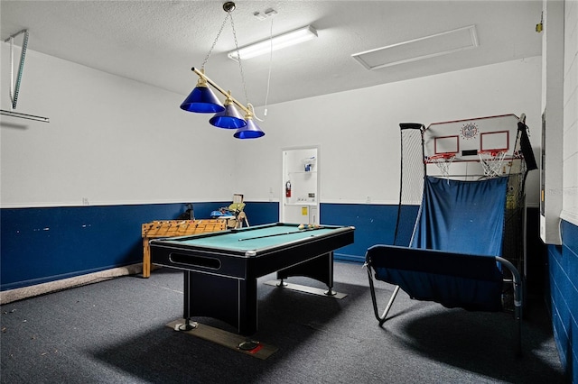 playroom featuring a textured ceiling and billiards