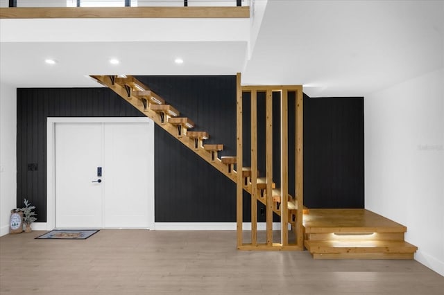 entryway with wood-type flooring