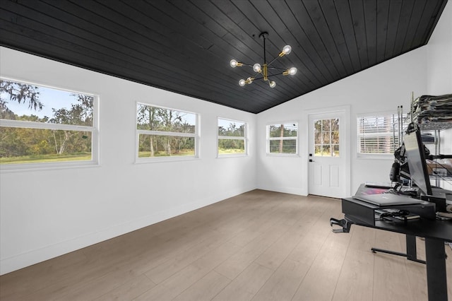 workout area with lofted ceiling, light wood-type flooring, wooden ceiling, and an inviting chandelier