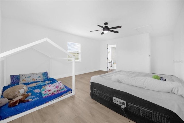 bedroom featuring light hardwood / wood-style flooring and ceiling fan