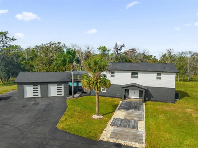 view of front of home with a front lawn