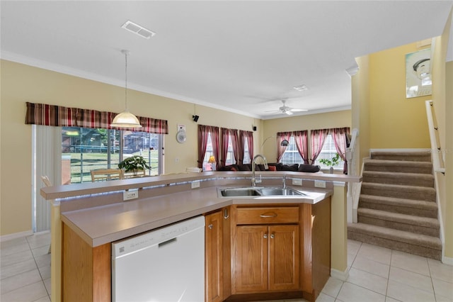 kitchen with ceiling fan, sink, white dishwasher, a kitchen island with sink, and light tile patterned flooring