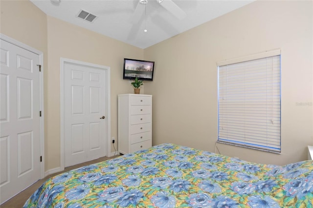 bedroom with ceiling fan and carpet