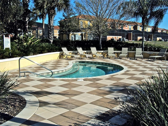 view of pool featuring a patio area