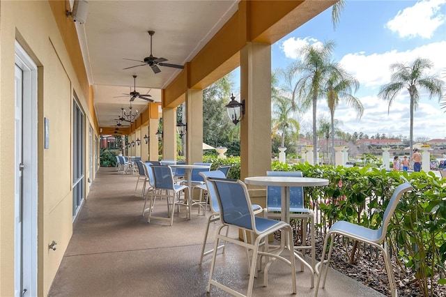 view of patio featuring ceiling fan