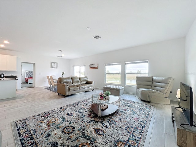 living room featuring light hardwood / wood-style floors