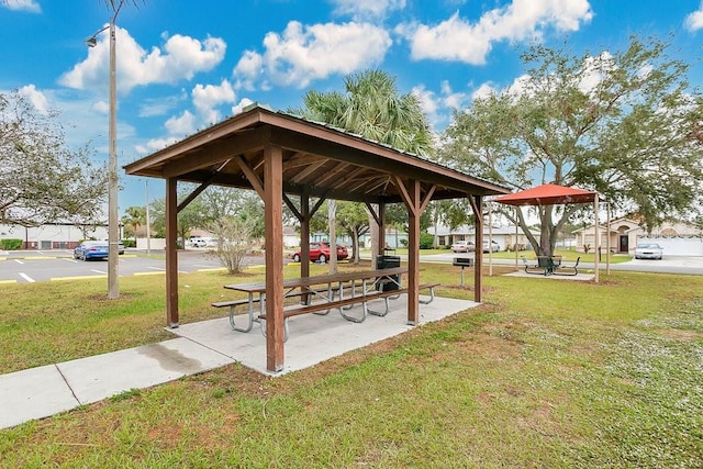 view of property's community with a gazebo and a lawn