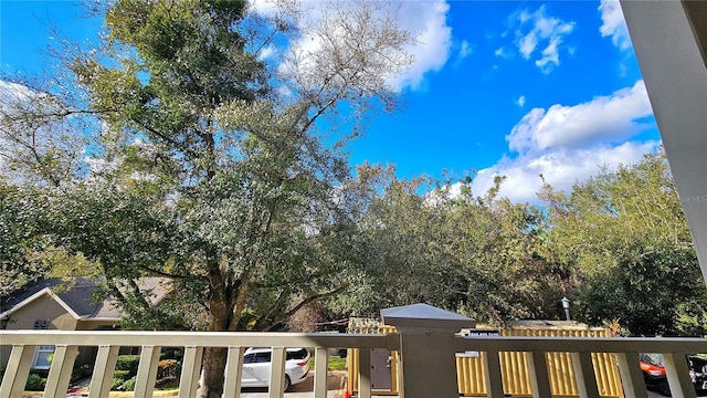 view of yard with a balcony