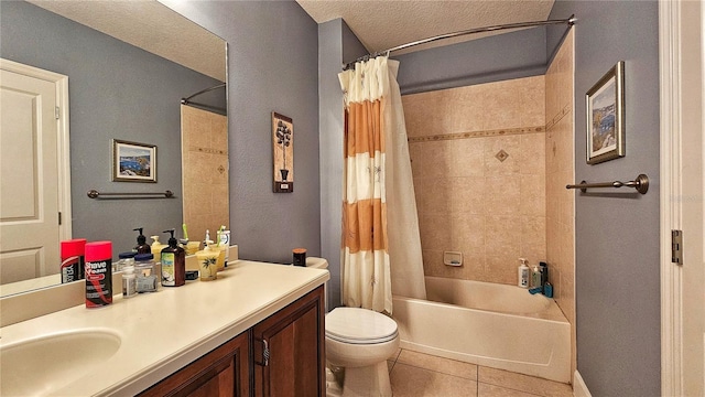 full bathroom with vanity, shower / bath combination with curtain, tile patterned flooring, toilet, and a textured ceiling